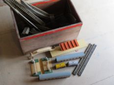 A quantity of metal Hornby Dublo railway track and carriages inc level crossing, platform,