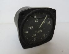 An instrument panel dial having broad arrow upon, to measure knots.