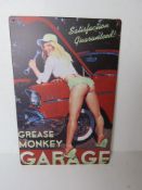 A contemporary metal garage pin up type advertising sign, 30 x 20cm.