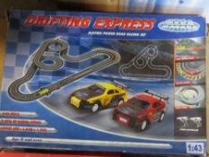 Two slot car racing sets being Disney Pixar Cars and Drifting Express in play worn condition.