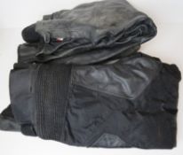 Two pairs of motorcycle trousers.