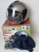 A boxed motorcycle helmet, for decorative purposes.