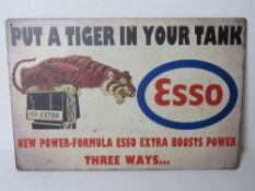 A contemporary metal garage Esso advertising sign 'Put a tiger in your tank', 30 x 20cm.