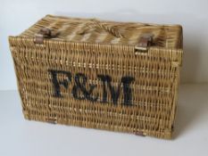 A Fortnum & Mason wicker hamper measurin