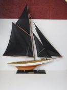 A model pond yatch 'Columbia' having bla