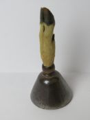A deer slot hand bell.