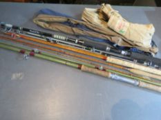 Four assorted fishing rods inc 'The Rive
