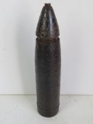 An inert WWII German 7.5cm le.IG 18 shel