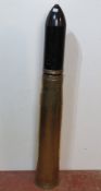 An inert 105mm TK HESD shell, the case d