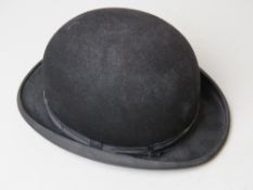 An Austin Reed bowler hat size 7 1/8