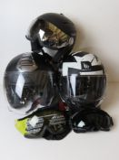 Three motorbike helmets for decorative display purposes only.