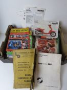 A quantity of assorted vehicle parts catalogues and automotive magazines.