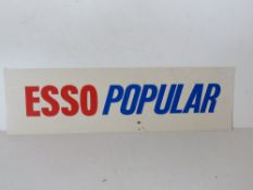 A printed plastic Esso Popular sign measuring approx 57.5cm wide.