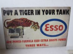 A contemporary metal garage Esso 'Put a tiger in your tank' advertising sign, 30 x 20cm.
