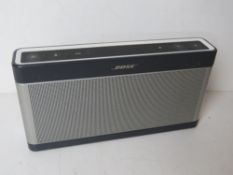 A Bose Soundlink Bluetooth speaker III. No cable.