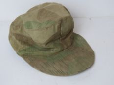 A WWII German Splinter pattern cap.