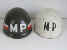 A 1970s US M1 MP helmet liner and a 1955