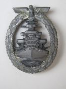 A WWII German Battle Cruiser badge, clasp a/f marked to back FEC ADOLF BOCK AUSF SCHWERIN Berlin.