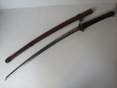 A Japanese katana having quatrefoil shaped cast tsuba decorated with cherry blossom,