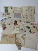 A quantity of 1930s German postcards, stamped envelopes and other items of philatelic interests.