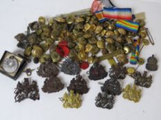 Six Suffolk Regiment badges,