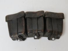 A WWII German K98 ammo pouch, dated 1938, indistinct makers mark.