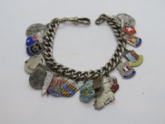 A HM silver watch guard chain converted for use as a charm bracelet,