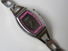 A ladies stainless steel Fossil wrist watch having pink chapter ring numbered ES9677 250311