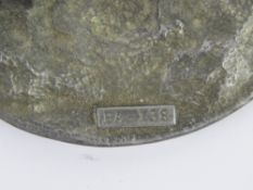 A Buckles of American Native American themed belt buckle having buffalo to centre,