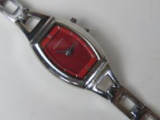 A ladies stainless steel Fossil wrist watch having red dial numbered ES-9566 250303