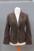 A brown coloured ladies jacket by Maze,