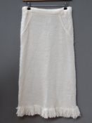 A 55% wool knitted skirt in cream size 1