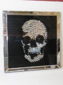 A black printed mirror featuring a Gothi