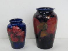 Two small sized Moorcroft vases, one having impressed back stamp,