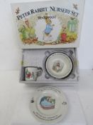 Peter Rabbit nursery set by Wedgwood comprising mug, plate and oatmeal in original packaging.