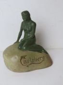 Breweriana; a mid 20th century Carlsberg Mermaid composite advertising figurine, approx 13cm high.