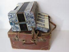 A Mastertone accordion in leather case, a/f.