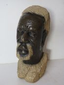 A stoneware male bust.