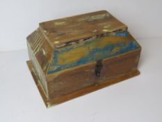 A wooden casket type table top box.
