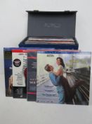 A quantity of assorted laser discs within a single leatherette travel case. List attached verso.