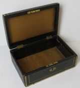 A delightful vintage green leather covered jewellery box having gilt decoration,