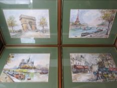 A set of four city scene prints including Arc de Triomphe, Eiffel Tower, etc, in matching frames,