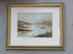 Watercolour of a Scottish Loch having mountains beyond, framed and mounted in floral carved frame,