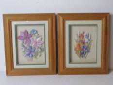A pair of contemporary floral decoupage within pine frames, each measuring 28 x 23cm overall.