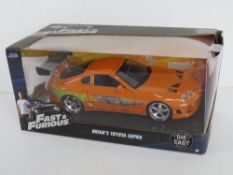 A die cast Fast & Furious Toyota Supra s