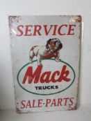 A contemporary metal garage Mack Trucks