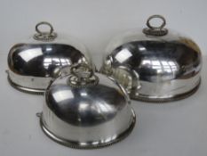 A set of 3 graduated silver plated Mappin & Webb tureen covers largest 40cm wide smallest 30cm wide