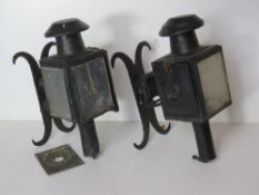 A pair of black painted carriage lamp type wall sconces, for restoration.