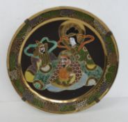 A decorative Japanese charger approx 37cm dia, having gilt decoration throughout.