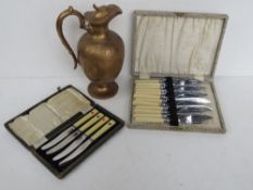 A set of 4 bridge themed butter knives in fitted case.